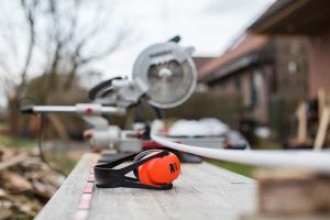 a contractor's table saw and ear protection