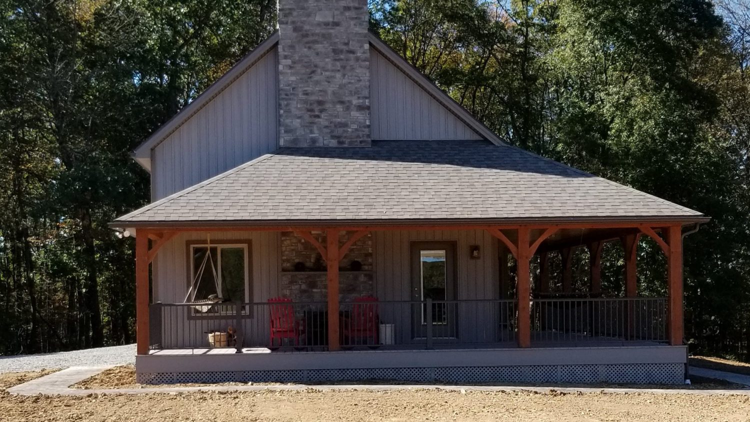 newly constructed house with a wrap-around porch