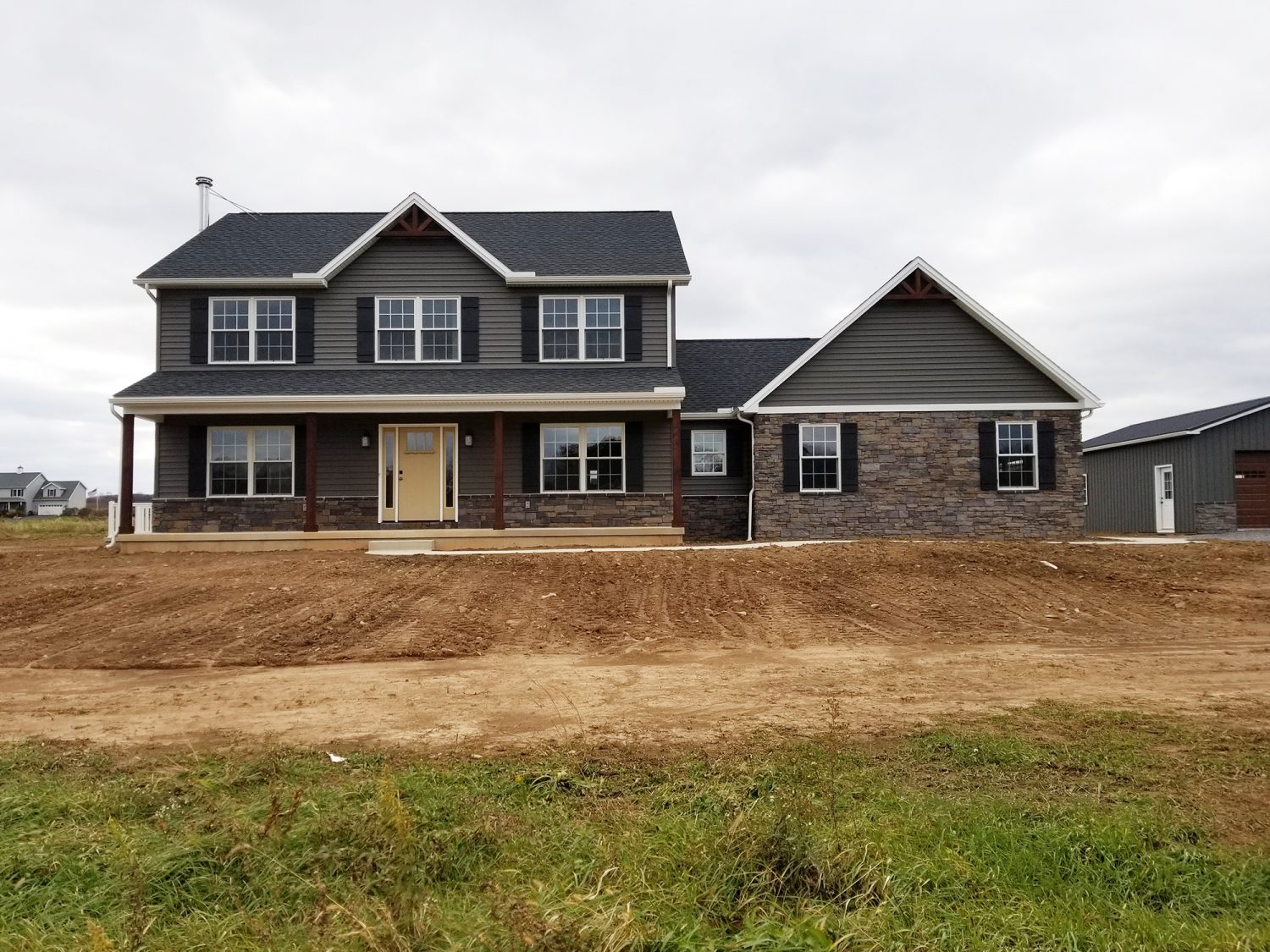 New Home Construction with Stone Siding