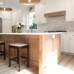 kitchen remodel with white cabinets and wooden island