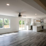 new kitchen and living room space in a new home