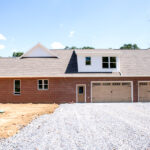 back view of new home with garage