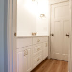 bathroom sink and cabinets in a new home