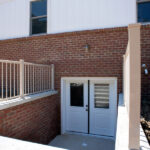 staircase to the basement doors of new home