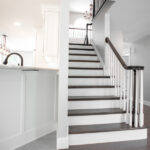 staircase next to kitchen, renovated house