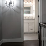 hallway at the top of the stairs to bathroom