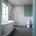 new tub, toilet, and shower in new bathroom