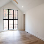 open living room space with large windows