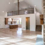 living space to the loft, kitchen, and half bathroom