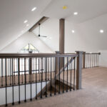 carpeted loft space in a new home
