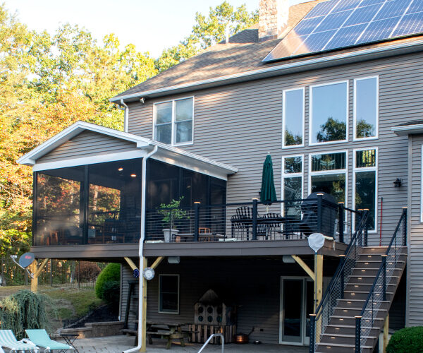 second story deck replacement with a dining area and screen room