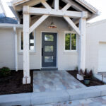 covered front porch of a home after a renovation