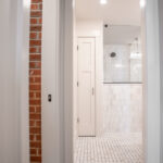 doors leading to the bathroom and toilet room