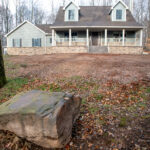 home with a new front porch after a siding remodel