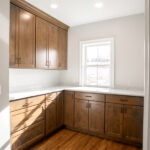 hardwood kitchen cabinets with white counter