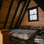 remodeled upstairs loft with hardwood walls and three cots