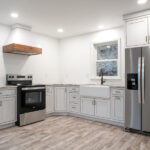 new kitchen with white cabinets