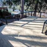 new wooden deck with cable railings