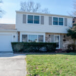 home after a siding renovation and garage addition
