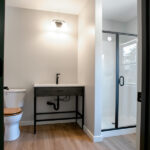 bathroom after renovation with new walk in shower