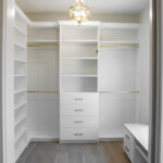 large walk in closet with lots of storage