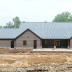 new home with a back porch