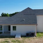 new home with a back porch