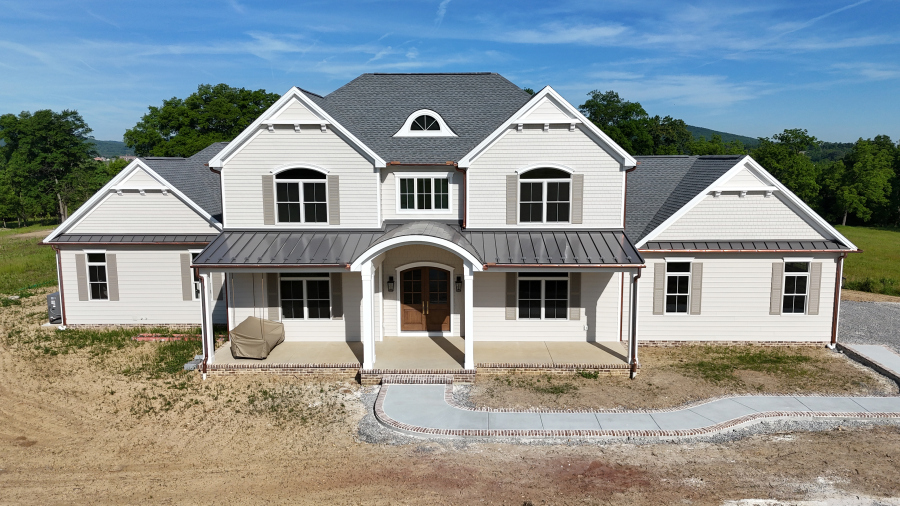 DJI_20260605084152_0019_D front view of new home