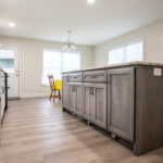 island with lots of cabinet space in new kitchen