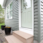 front porch with new windows and siding