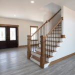 front door and staircase to second floor