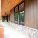 windows and stone veneer for new home