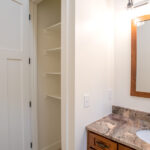 bathroom with storage closet