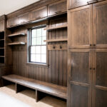 large cabinet built in storage in laundry room