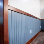 wooden and blue painted baseboards