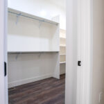 large walk in closet with ample hanging space