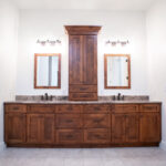 double sink with wooden cabinets