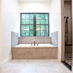bathtub and walk in shower in bathroom