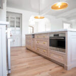 kitchen island with sink and dishwasher