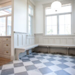 mudroom with benches and checkered floors