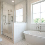 bathroom with tub and walk in shower