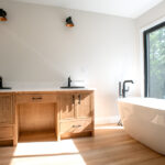 double sink and bathtub in new master bathroom