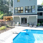 double doors leading to backyard pool area