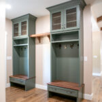 mudroon with green cabinet storage
