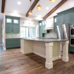 new kitchen with green cabinets