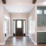 front door leading to kitchen