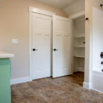 new bathroom with tub/shower and closet space
