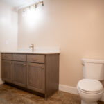new bathroom with sink and toilet
