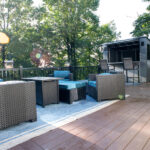 outdoor sitting area and bar on a renovated deck