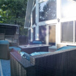 renovated deck with weather-resistant outdoor furniture